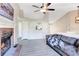Comfortable living room featuring a brick fireplace and an open layout great for entertaining at 3337 Camens Way, Buford, GA 30519