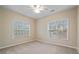 Bedroom boasting dual windows and plush carpet for comfort at 460 Tribble Gap Rd # 1004, Cumming, GA 30040
