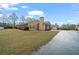 Inviting single story home boasting brick and vinyl siding and a well-manicured lawn at 460 Tribble Gap Rd # 1004, Cumming, GA 30040