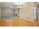 Spacious living room with hardwood floors and a fireplace at 460 Tribble Gap Rd # 1004, Cumming, GA 30040