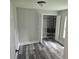 Cozy bedroom featuring new flooring, fresh paint, closet, and modern ceiling fan at 1956 Shirley Sw St, Atlanta, GA 30311