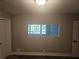 Bedroom featuring two closets and a pass-through window to another room at 1956 Shirley Sw St, Atlanta, GA 30311