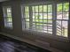 Bedroom windows showcase natural light and views to the front yard at 1956 Shirley Sw St, Atlanta, GA 30311