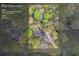 Aerial view of a home surrounded by trees on a 1.14-acre lot at 3595 Limberlost Sw Trl, Stockbridge, GA 30281