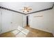A simple bedroom provides neutral walls, cozy carpeting, and ample space for personalization at 3595 Limberlost Sw Trl, Stockbridge, GA 30281