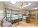 Bright breakfast nook offering bench seating, table, and a bay window looking out to the backyard at 3595 Limberlost Sw Trl, Stockbridge, GA 30281