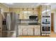 Well-equipped kitchen with stainless steel appliances and ample cabinet space at 3595 Limberlost Sw Trl, Stockbridge, GA 30281