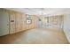 Cozy living room features vintage-style paneling, retro lighting, and a stained-glass window accent at 3595 Limberlost Sw Trl, Stockbridge, GA 30281