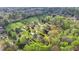 Aerial view showing the property location in a lush, green, neighborhood setting at 4995 Hyde Ct, Cumming, GA 30040
