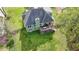 Beautiful aerial view of the backyard with deck and a fenced property line at 4995 Hyde Ct, Cumming, GA 30040