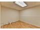 Finished basement space with hardwood flooring and neutral-colored walls providing a clean and versatile area at 4995 Hyde Ct, Cumming, GA 30040