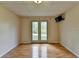 Basement with hardwood floors and backyard access at 4995 Hyde Ct, Cumming, GA 30040