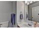 Bathroom featuring a toilet, a mirror, a white sink, and grey paint at 4995 Hyde Ct, Cumming, GA 30040