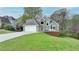 Charming two-story home with an attached two-car garage and a cozy front deck at 4995 Hyde Ct, Cumming, GA 30040