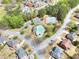 Aerial view of the community pool, tennis court, and surrounding neighborhood at 2570 Middleton Way, Grayson, GA 30017