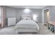Bright bedroom featuring carpeted floors, white walls, and minimalist decor at 2570 Middleton Way, Grayson, GA 30017