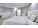 Bright bedroom featuring carpeted floors, white walls, and minimalist decor at 2570 Middleton Way, Grayson, GA 30017