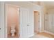 Bathroom with a toilet in a separate room and a shower, promoting privacy and convenience at 3019 Iona Ct, Snellville, GA 30039