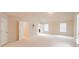 Spacious bedroom features neutral carpeting and ample natural light at 3019 Iona Ct, Snellville, GA 30039