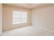 Bright bedroom with a large window and neutral carpet at 3019 Iona Ct, Snellville, GA 30039