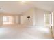 Large bonus room, neutral carpeting, and access to other rooms at 3019 Iona Ct, Snellville, GA 30039