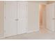 Bedroom closet with double doors for ample storage at 3019 Iona Ct, Snellville, GA 30039
