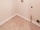 Laundry room with tiled flooring and connections for a washer and dryer for convenient chores at 3019 Iona Ct, Snellville, GA 30039