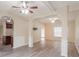 Spacious living room with hardwood floors, arches, and open layout, perfect for entertaining at 3019 Iona Ct, Snellville, GA 30039