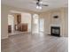 View of the open-concept living room into the kitchen with breakfast bar seating at 3019 Iona Ct, Snellville, GA 30039