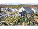 Aerial view of a residential neighborhood with mature trees and well-maintained homes at 4835 Fields Bridge Rd, Cumming, GA 30028