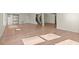 Open basement area with wood flooring and natural light at 4835 Fields Bridge Rd, Cumming, GA 30028