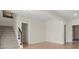 Unfinished basement with stairs, recessed lighting, and two visible doors at 4835 Fields Bridge Rd, Cumming, GA 30028