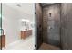 Modern bathroom with glass-enclosed shower, stylish vanity, and heated towel rack at 4835 Fields Bridge Rd, Cumming, GA 30028
