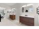 Bright bathroom with dual vanities, modern mirrors, and sleek fixtures at 4835 Fields Bridge Rd, Cumming, GA 30028