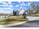 A two-story home on a large lot, featuring a basketball court and an attached three-car garage at 4835 Fields Bridge Rd, Cumming, GA 30028