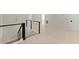 Upstairs hallway showcasing modern railing and hardwood flooring at 4835 Fields Bridge Rd, Cumming, GA 30028