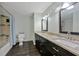 Updated bathroom features double sink vanity with granite counters and updated shower at 6351 Wedgeview Ct, Tucker, GA 30084