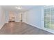 Open bedroom with closet and walk-out to private patio at 6351 Wedgeview Ct, Tucker, GA 30084