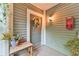 Charming front porch featuring a lovely wreath and tasteful decor at 6351 Wedgeview Ct, Tucker, GA 30084