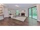 Cozy living room with a fireplace and access to the outdoors at 6351 Wedgeview Ct, Tucker, GA 30084