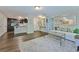Open-concept living room and kitchen with modern flooring at 6351 Wedgeview Ct, Tucker, GA 30084