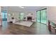 Cozy living room with fireplace and sliding glass door with hardwood flooring at 6351 Wedgeview Ct, Tucker, GA 30084