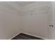 A walk-in closet equipped with sturdy wire shelving and dark vinyl flooring at 6351 Wedgeview Ct, Tucker, GA 30084