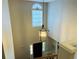 Elegant foyer with hanging light fixture and high ceilings at 9030 Brockham Way, Johns Creek, GA 30022