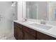 Elegant bathroom with double vanity, glass-enclosed shower, and stylish fixtures at 2026 Manchester Ne St, Atlanta, GA 30324