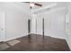 Spacious bedroom with an ensuite bathroom and a walk-in closet with hardwood floors at 2026 Manchester Ne St, Atlanta, GA 30324