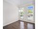 Dining room with hardwood floors, natural light, and contemporary chandelier at 2026 Manchester Ne St, Atlanta, GA 30324