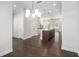 Open-concept kitchen with a large island, stainless steel appliances, and modern lighting fixtures at 2026 Manchester Ne St, Atlanta, GA 30324