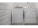 Laundry room with modern, front-load washer and dryer; a practical and functional space at 2026 Manchester Ne St, Atlanta, GA 30324