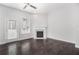 Sunlit living area with a marble fireplace and access to the outdoor patio at 2026 Manchester Ne St, Atlanta, GA 30324